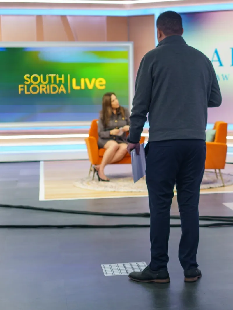 Jerry Martinez on set at a South Florida television studio